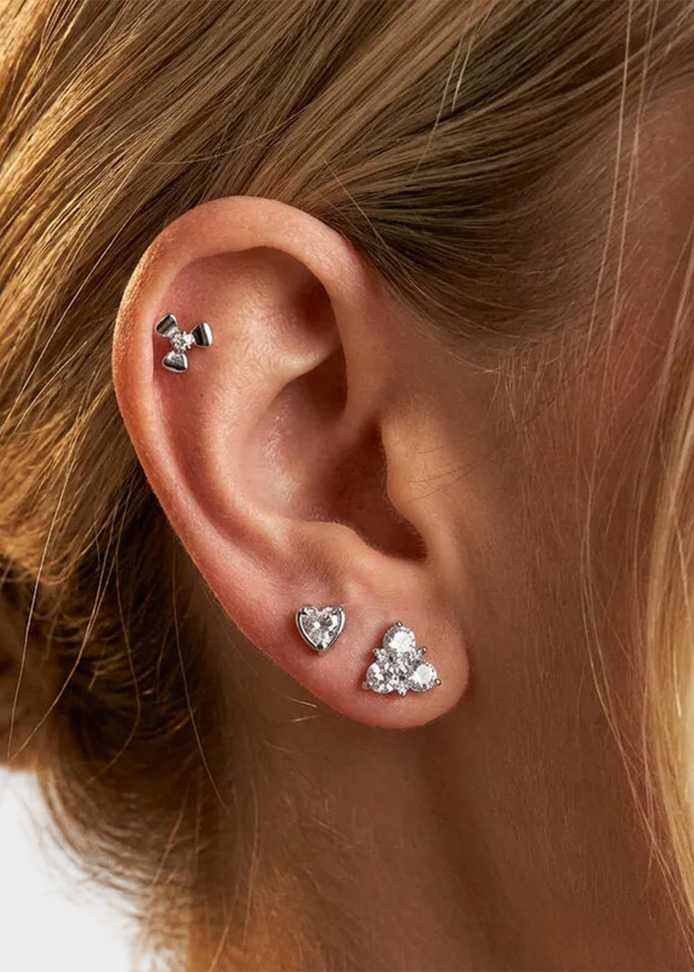 Orecchini in Metallo set da sei color argento fiocchi, cuori e cristalli a triangolo