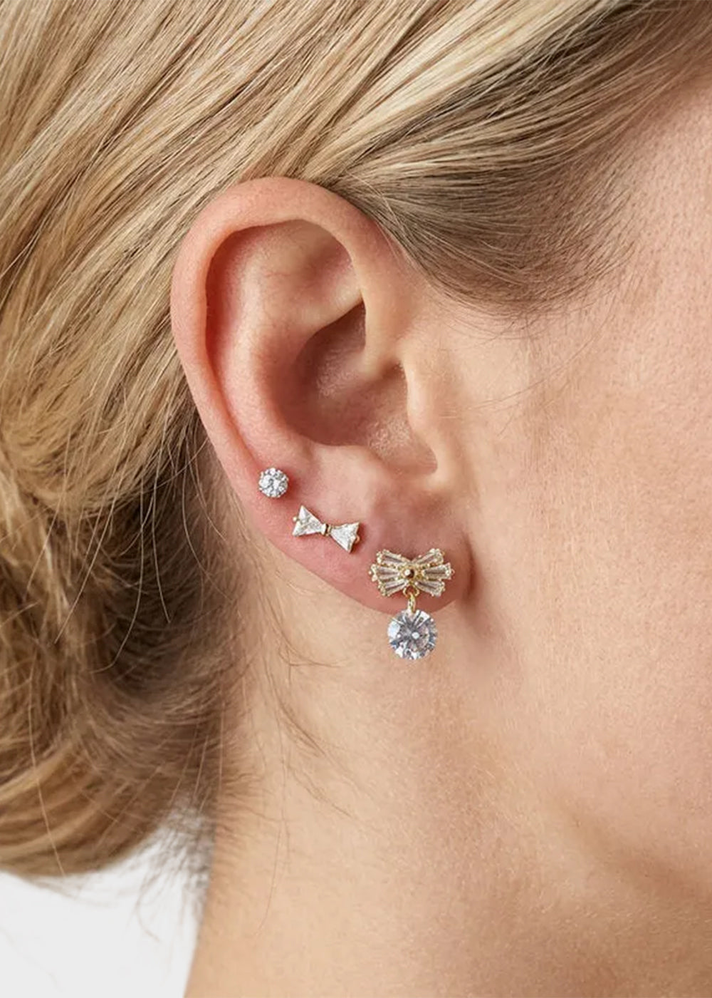 Orecchini in Metallo set da sei color oro con fiocchi e cristalli