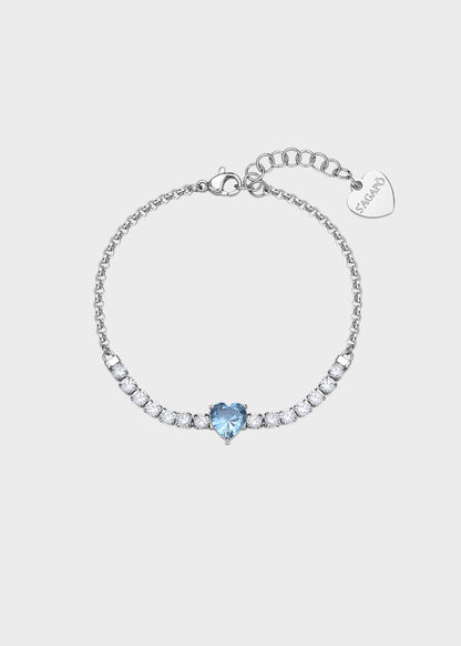 Bracciale Dazzly in acciaio con zirconi chiari e zircone centrale a forma di cuore azzurro