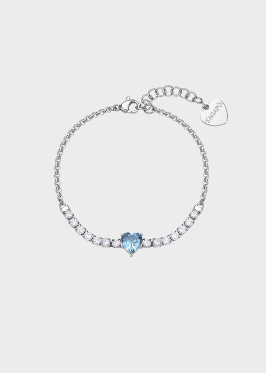 Bracciale Dazzly in acciaio con zirconi chiari e zircone centrale a forma di cuore azzurro