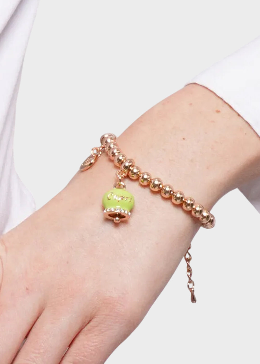 Bracciale in Metallo color oro rosa con maglia a sfere e campanella Capri verde chiaro-2