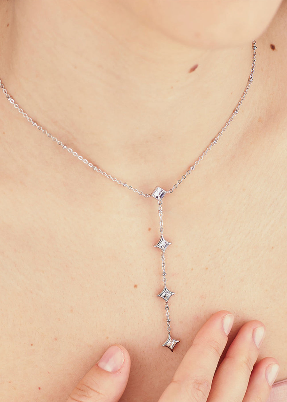 Collana Luce a "Y" in acciaio con pietre pendenti