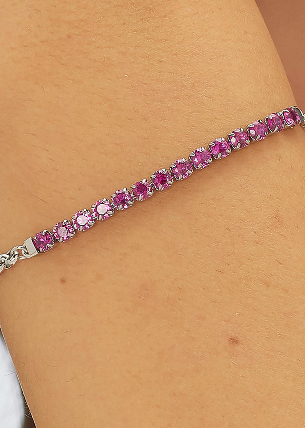 Bracciale Dazzly in acciaio con centrale tennis e cubic zirconia magenta