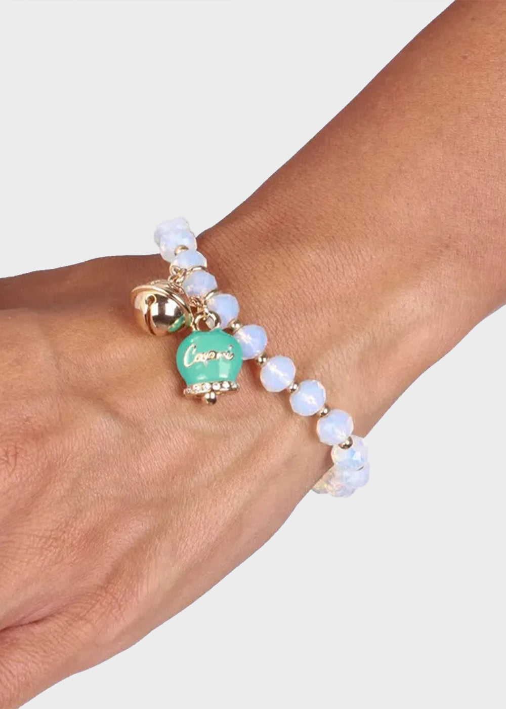 Bracciale in Metallo con campanella turchese, piccolo sonaglio e pietre bianche