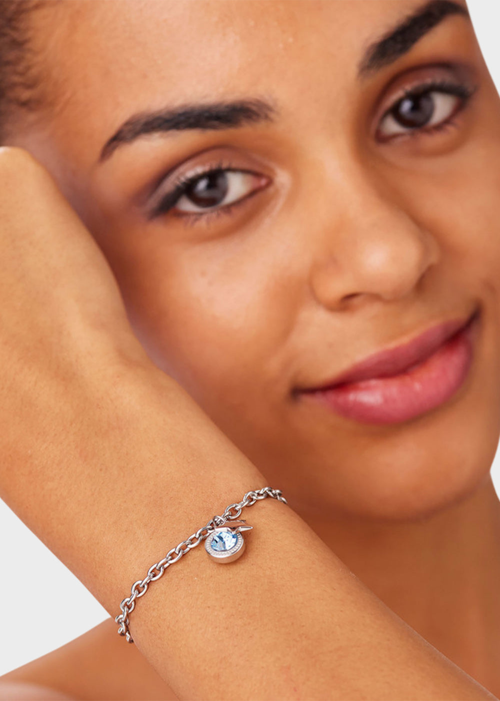 Bracciale catena Lucky Light in acciaio con cristallo azzurro e pendente a forma di stella