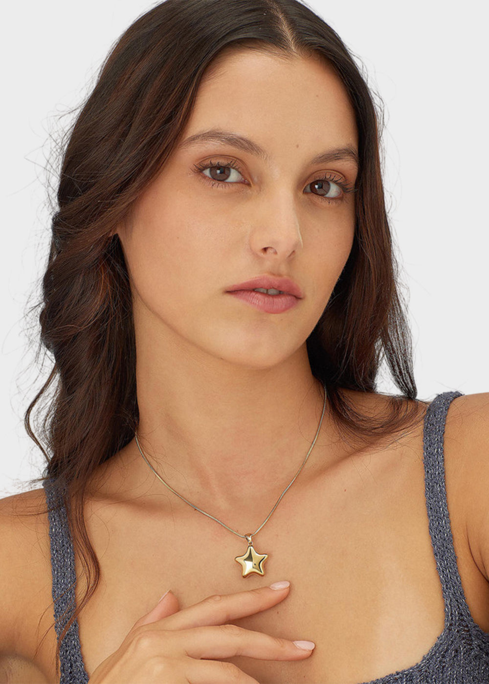 Collana Stellar in acciaio con finitura pvd oro 14K e pendente a forma di stella
