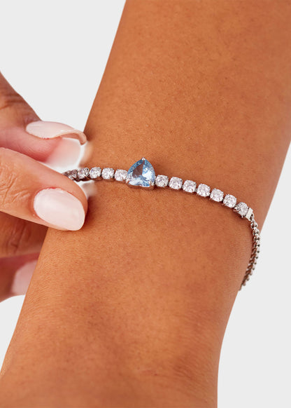 Bracciale Dazzly in acciaio con zirconi chiari e zircone centrale a forma di cuore azzurro