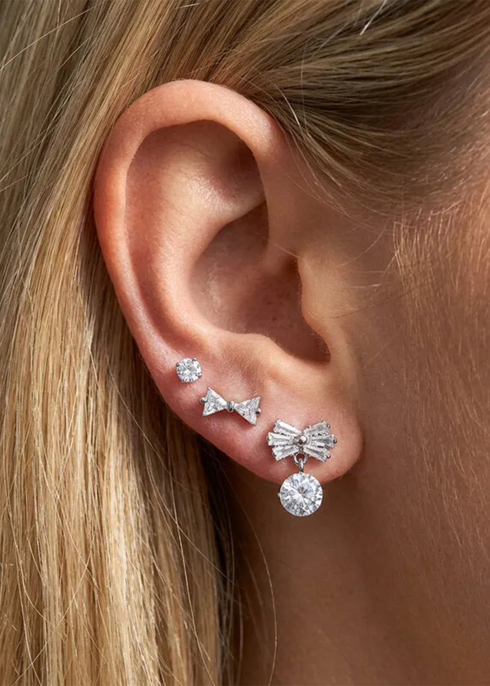 Orecchini in Metallo set da sei color argento con fiocchi e cristalli
