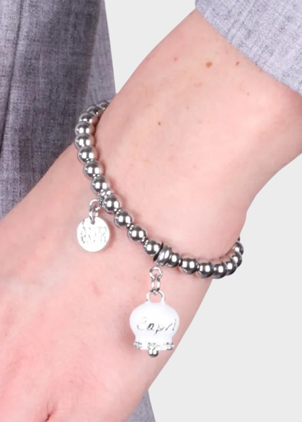 Bracciale in Acciaio a sfere color argento con campanella bianca con scritta Capri-2