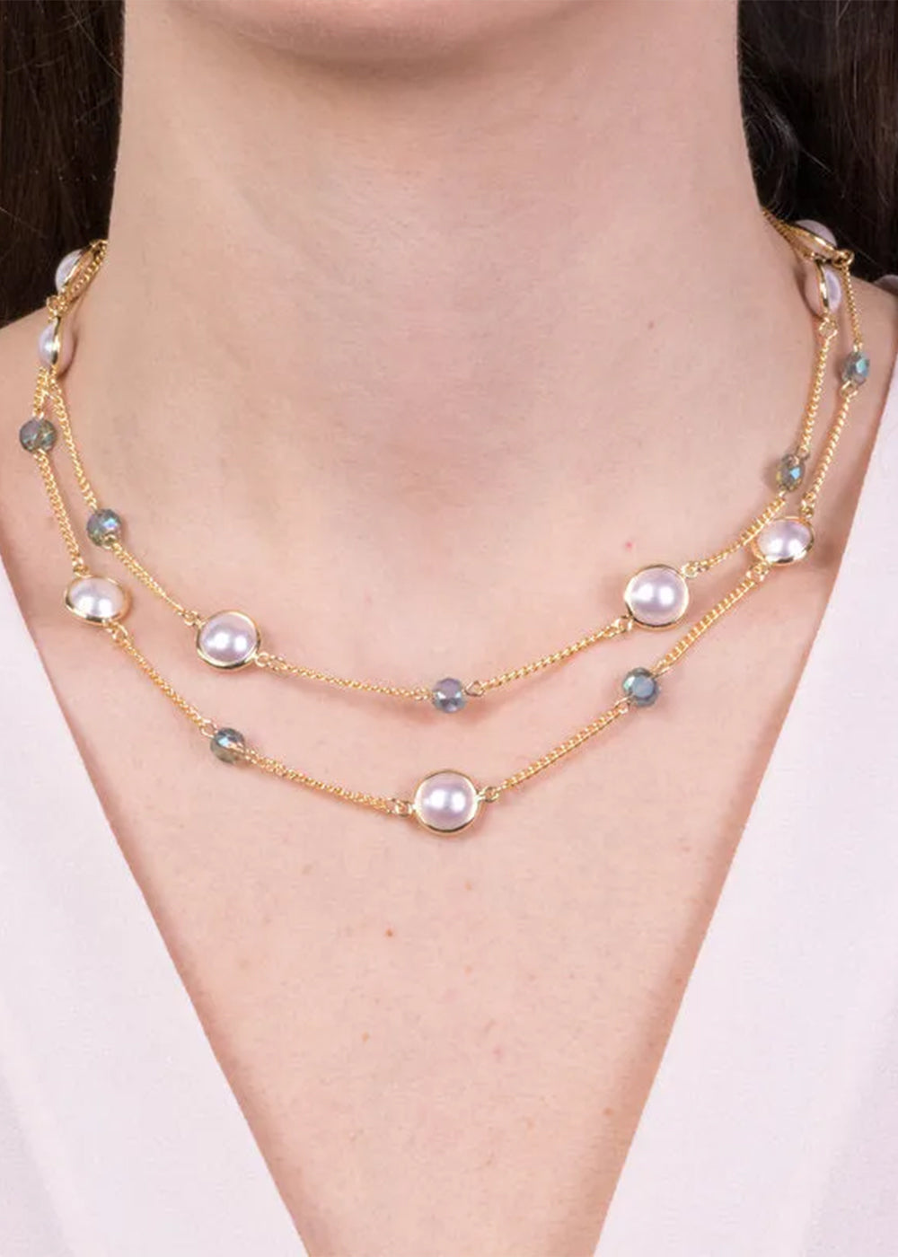 Collana in Metallo color oro con perline blu