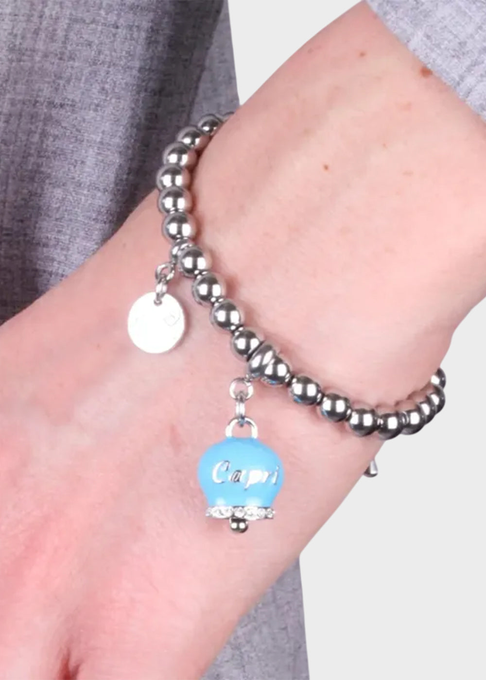 Bracciale in Acciaio a sfere color argento con campanella azzurra con scritta Capri-2