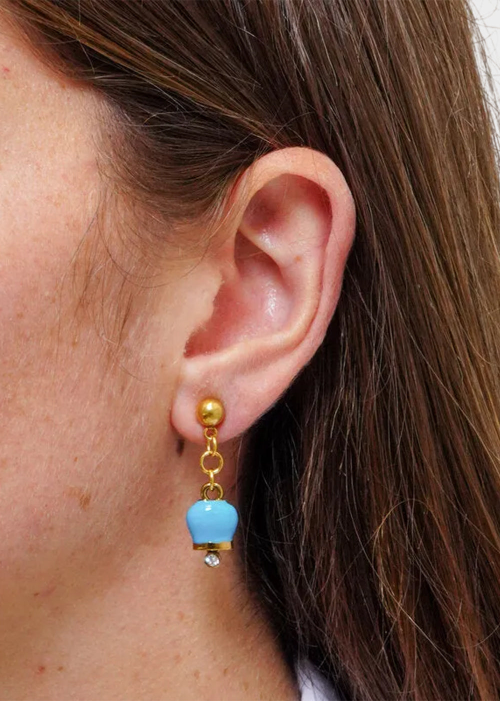 Orecchini in Acciaio color oro con campanella azzurro impreziositi da punto luce