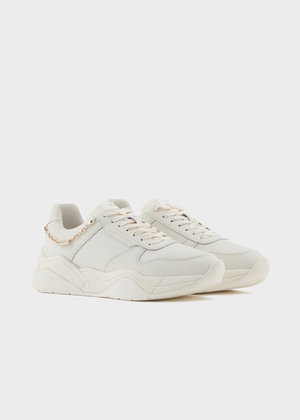 Sneakers con ciondolo
