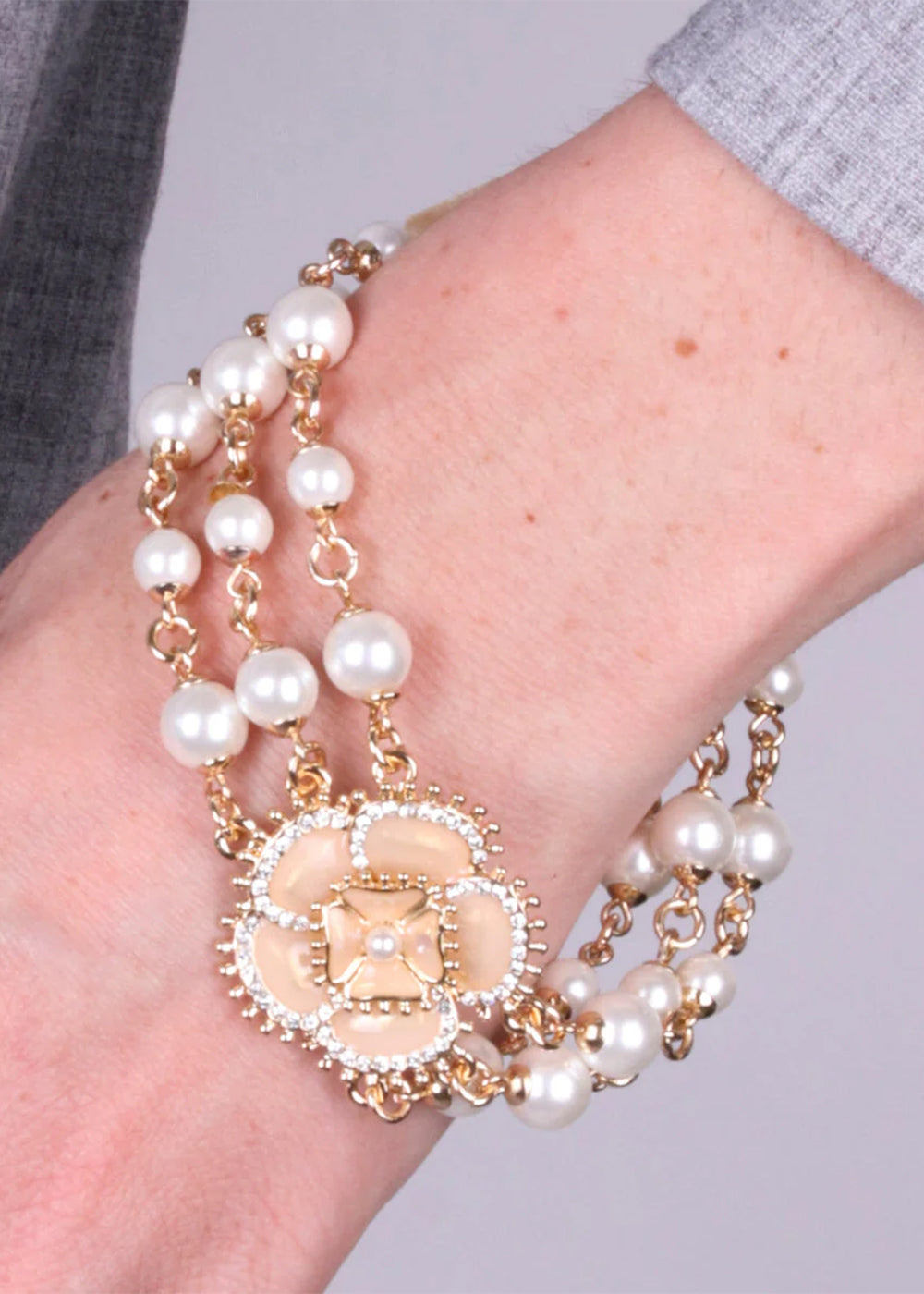 Bracciale in Metallo multifilo con fiore placcato oro