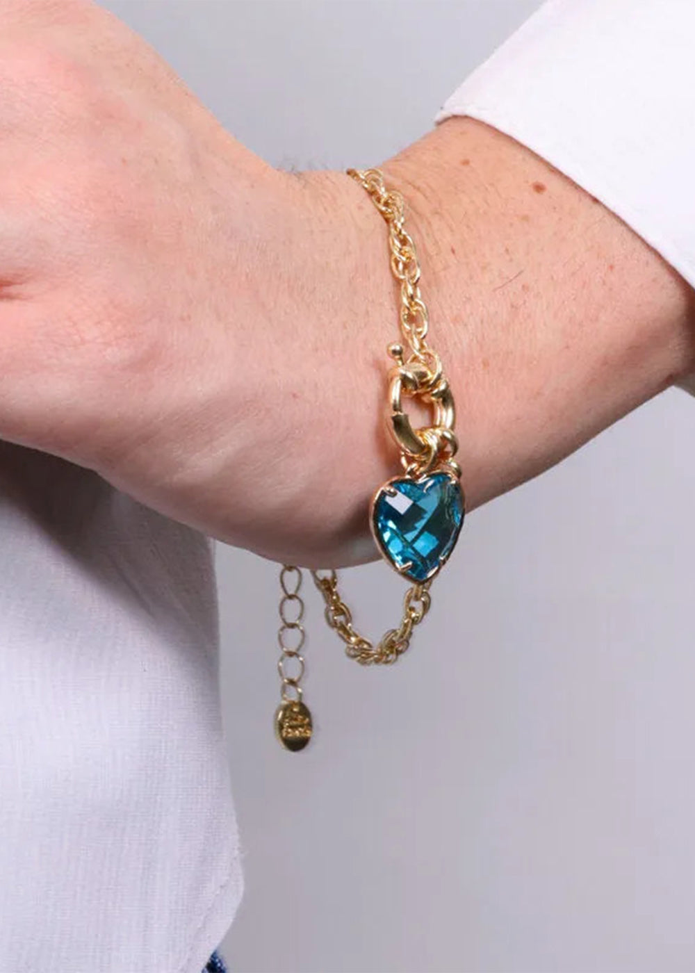 Bracciale in Metallo color oro con cuore azzurro