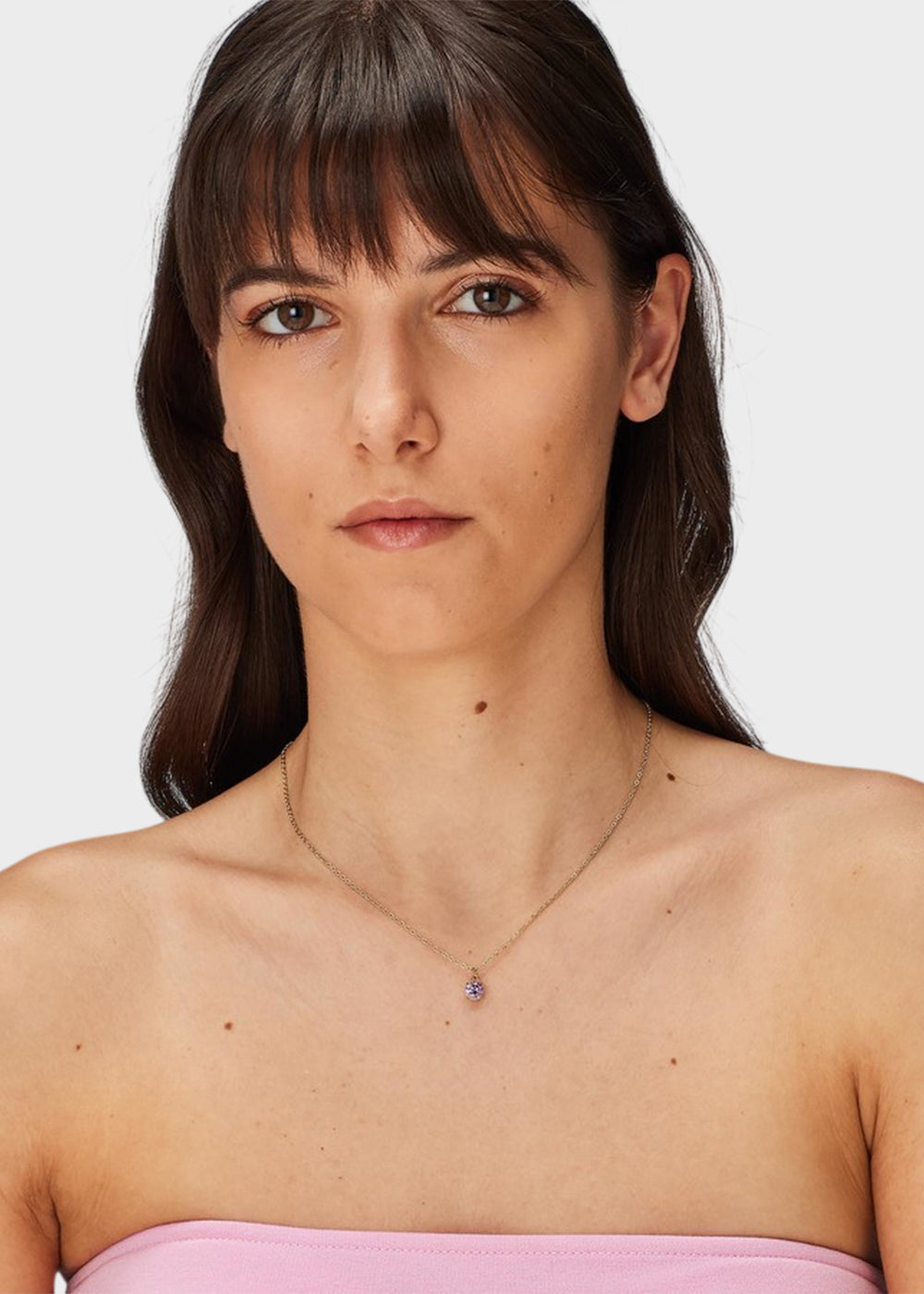 Collana Dazzly girocollo in acciaio con finitura pvd oro 14K e pendente centrale con pietra viola