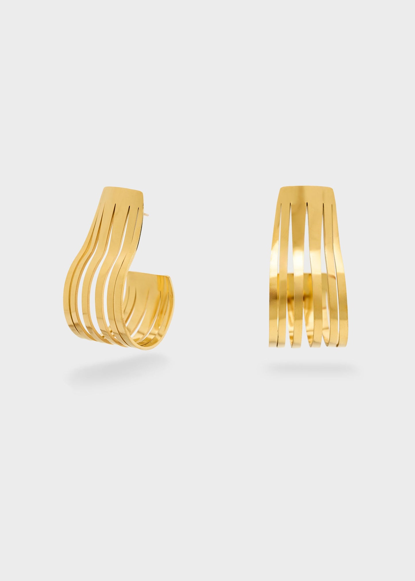 Orecchini in acciaio semicerchio sinuoso