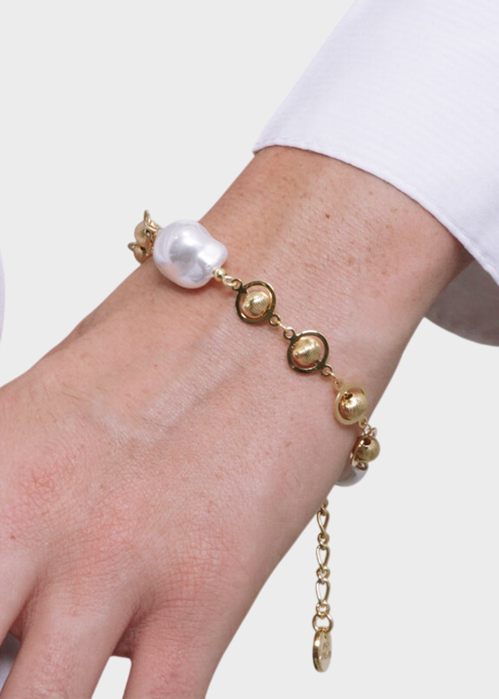 Bracciale in Metallo color oro con perle e sfere