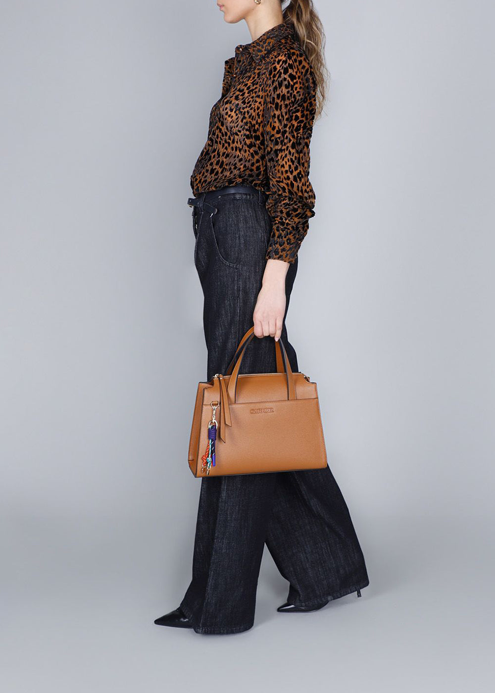 Shoulder bag with multicolored charms