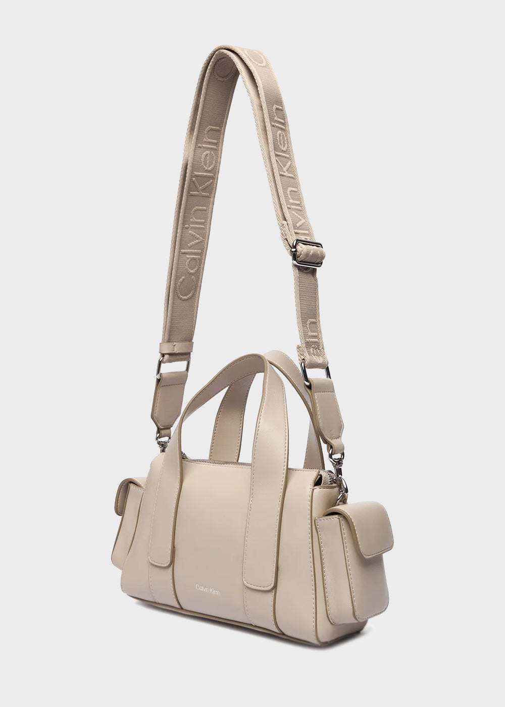 Handbag with shoulder strap and side pockets