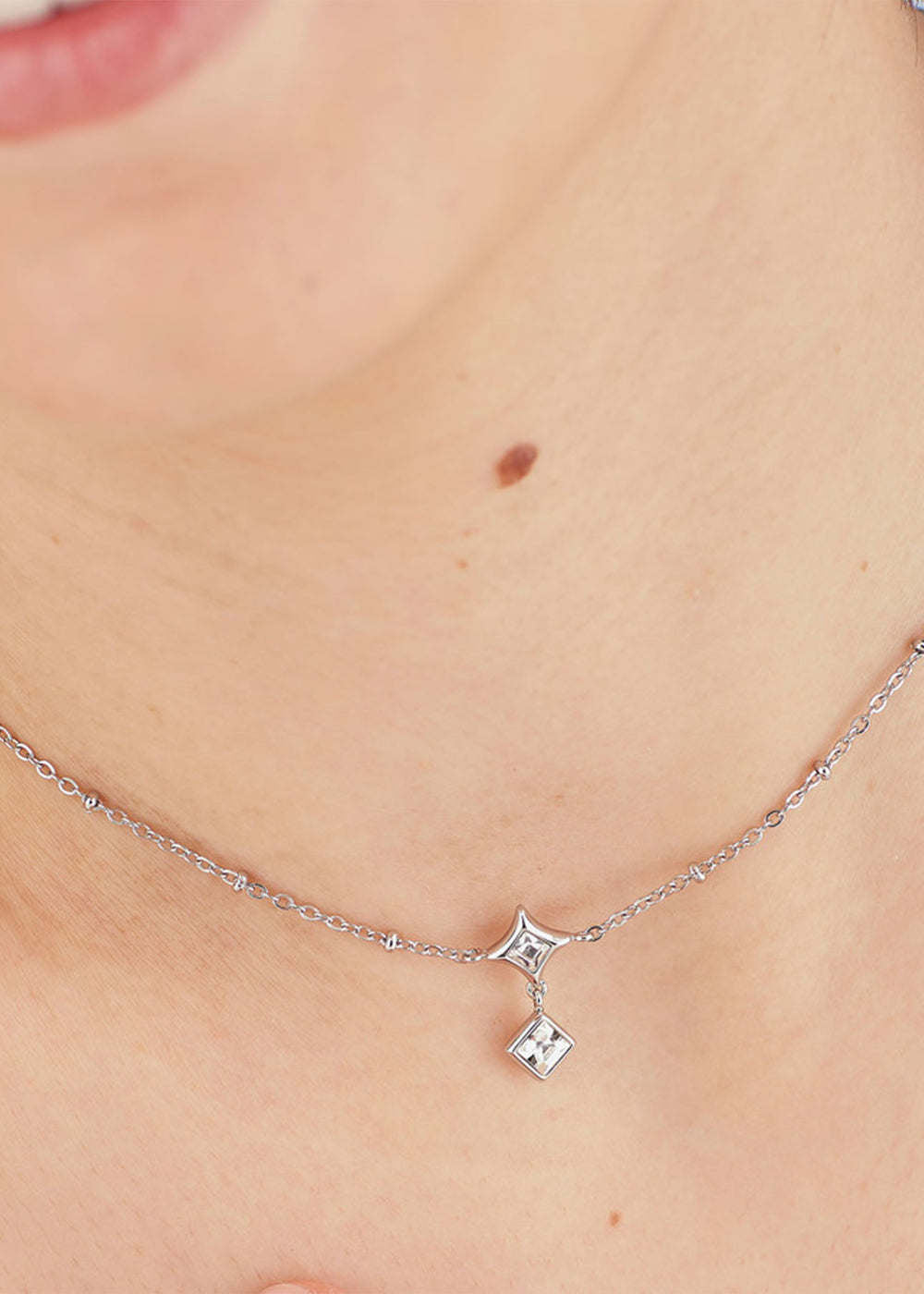 Collana Luce girocollo in acciaio con pietre pendenti