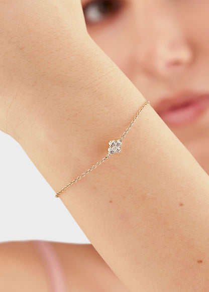 Bracciale Gleam in acciaio con finitura pvd oro 14K e cristalli centrali