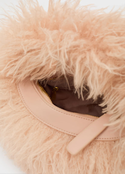 Borsa a mano Furry con tracolla e peli sintetici rosa