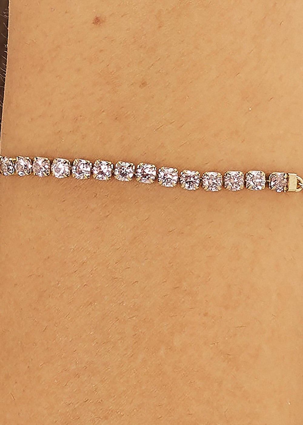 Bracciale Dazzly in acciaio con finitura pvd oro 14K e centrale tennis e cubic zirconia rosa