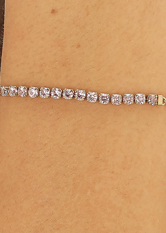 Bracciale Dazzly in acciaio con finitura pvd oro 14K e centrale tennis e cubic zirconia rosa