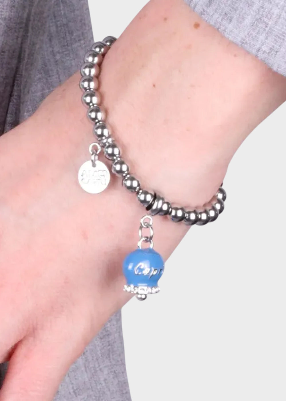 Bracciale in Acciaio a sfere color argento con campanella blu cobalto con scritta Capri-2