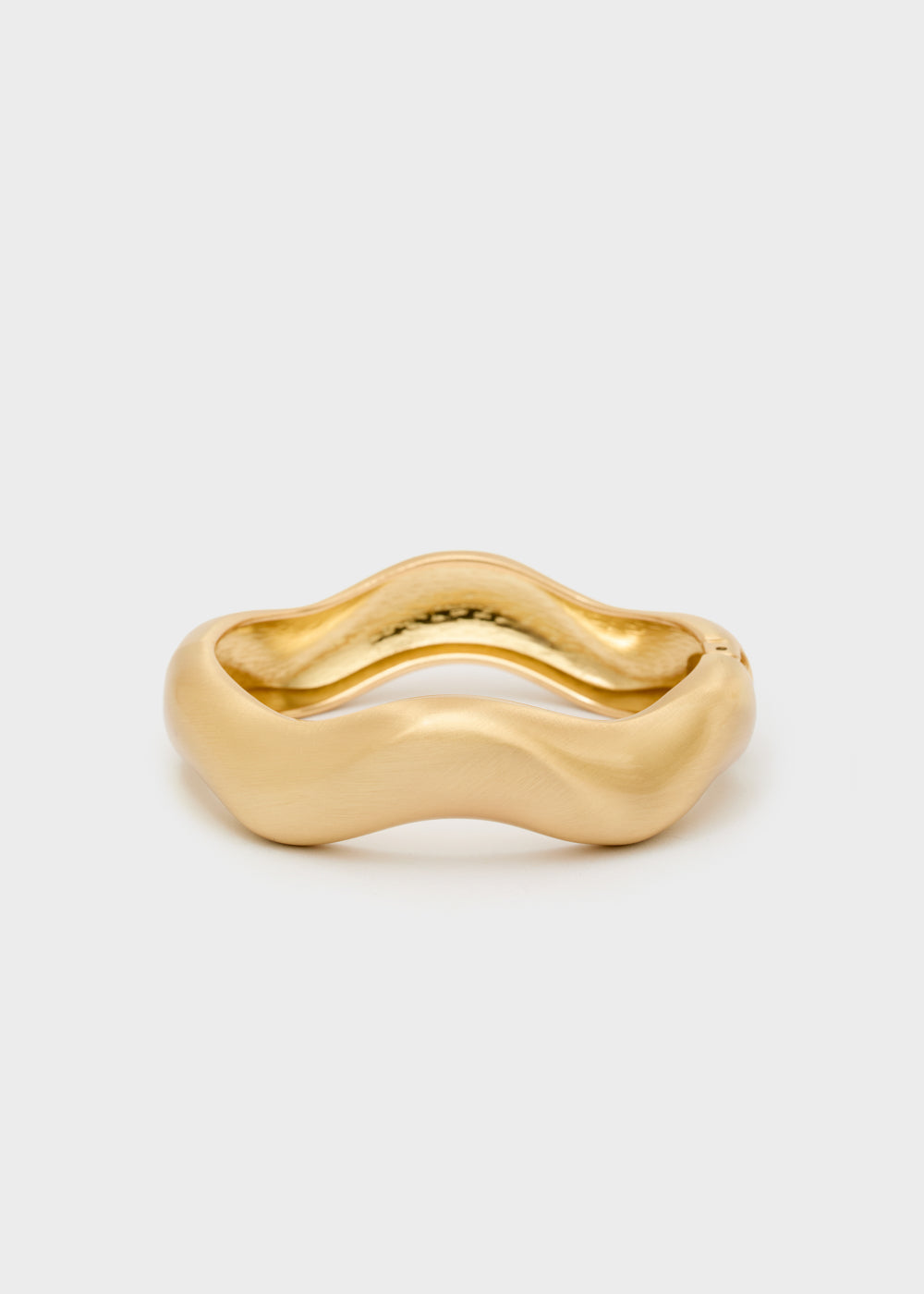 Rigid bracelet with spring opening
