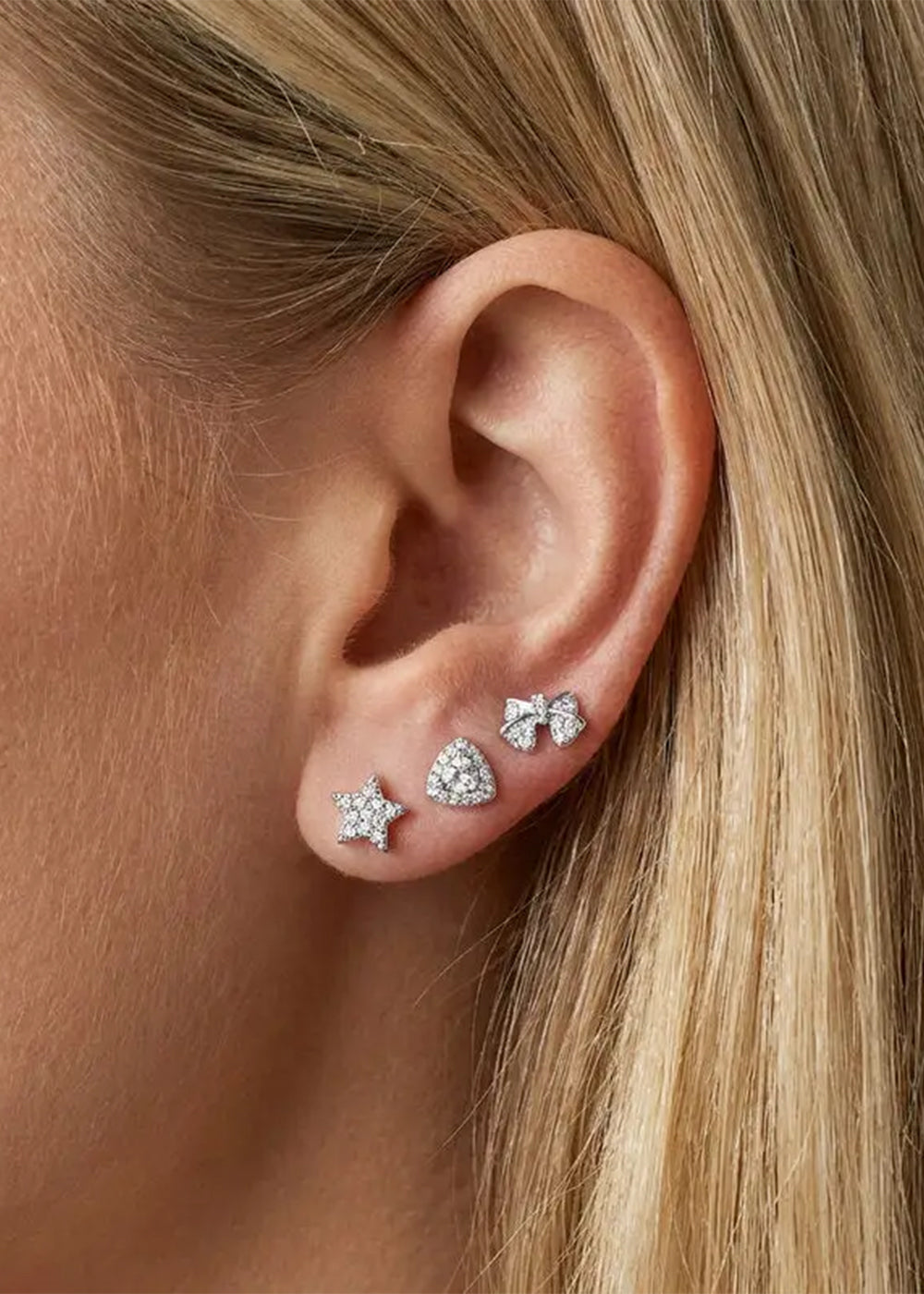 Orecchini in Metallo set da sei color argento stella e fiocco con cristalli