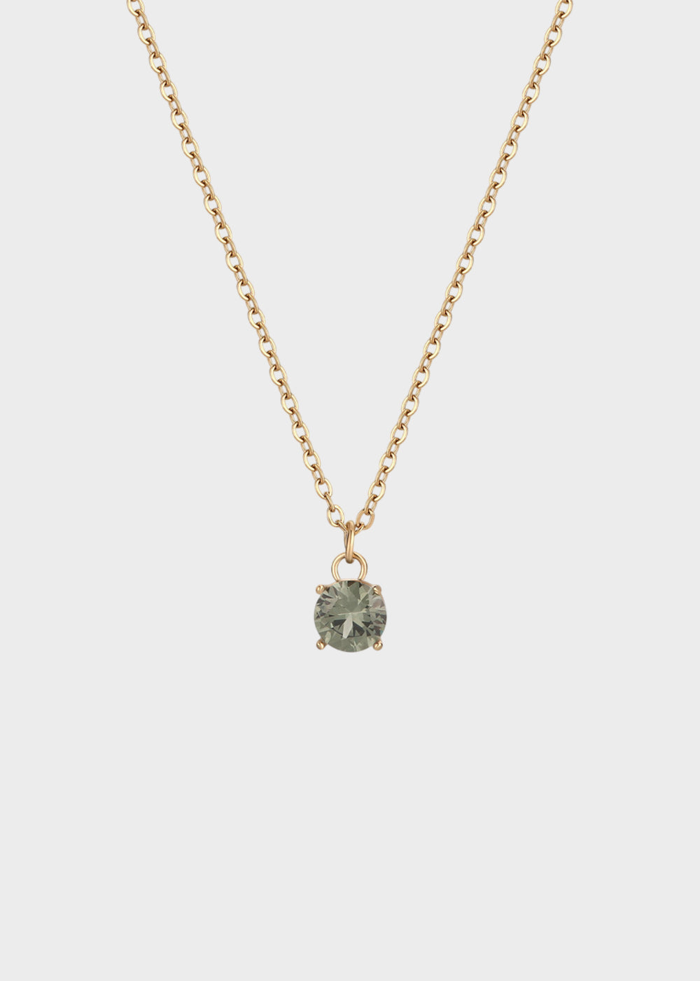 Collana Dazzly girocollo in acciaio con finitura pvd oro 14K e pendente centrale con pietra verde