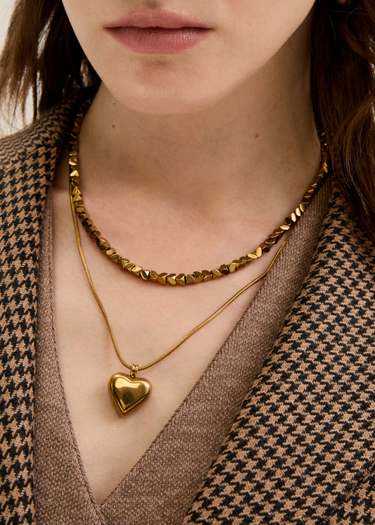 Stainless steel curved heart element necklace