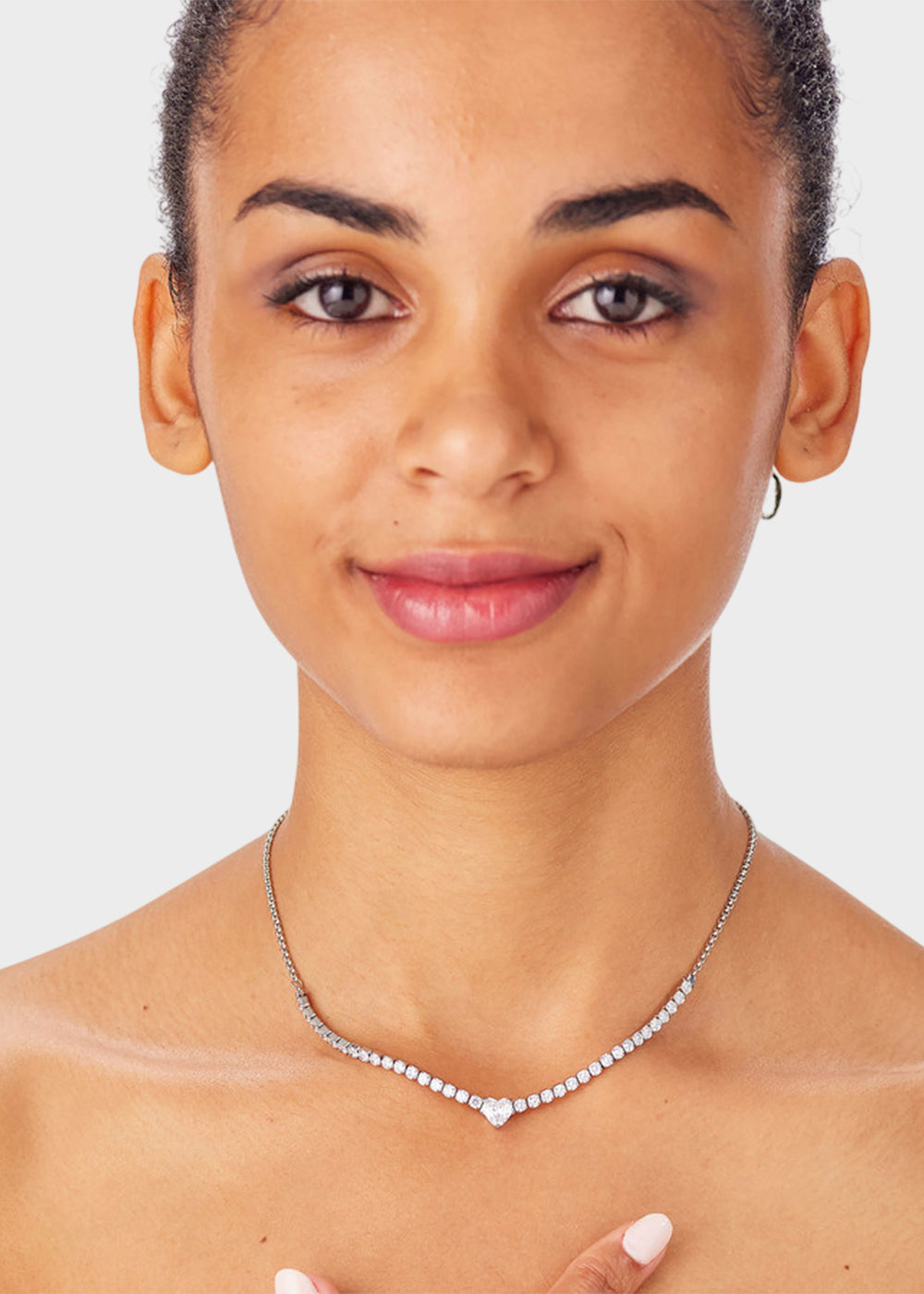 Collana Dazzly girocollo in acciaio con zirconi e zircone centrale a forma di cuore