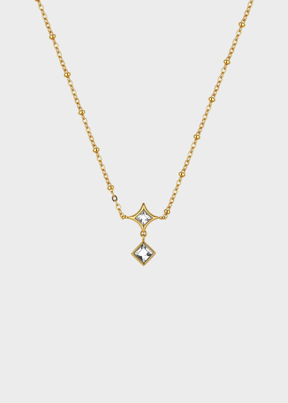 Collana Luce girocollo in acciaio con finitura pvd oro 14K e pietre pendenti